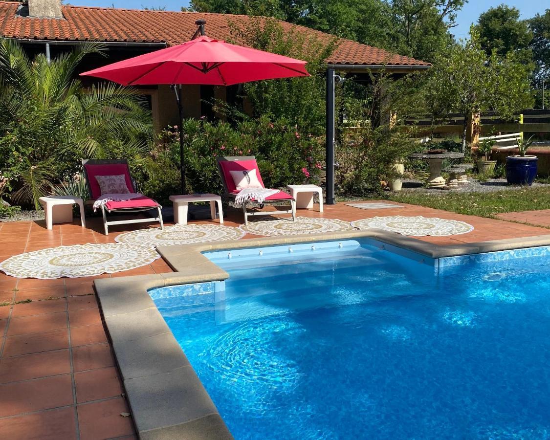 L'Hacienda Hotel Saint-Pierre-du-Mont  Bagian luar foto